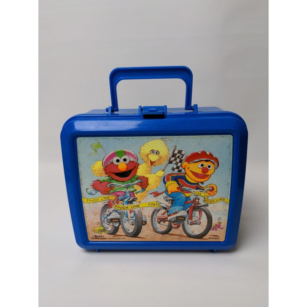 Aladdin lunch box sesame street riding bikes